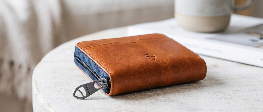 Mayfair zipper wallet in cognac leather on the table