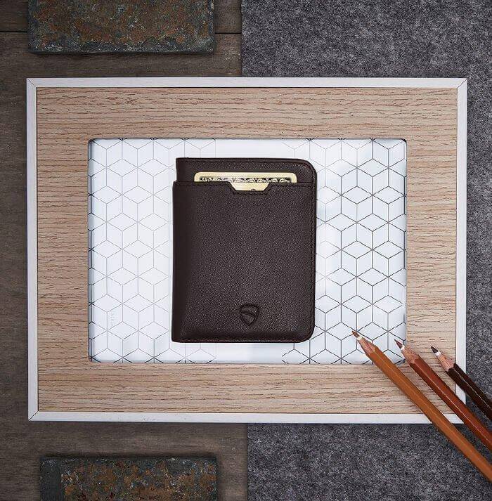 Innovative brown card holder by Vaultskin CITY, featuring invisible RFID protection in a minimalist leather design