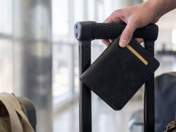 Kensington passport wallet in hand on airport