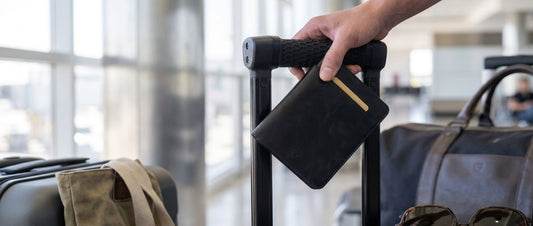 Kensington passport wallet in hand on airport