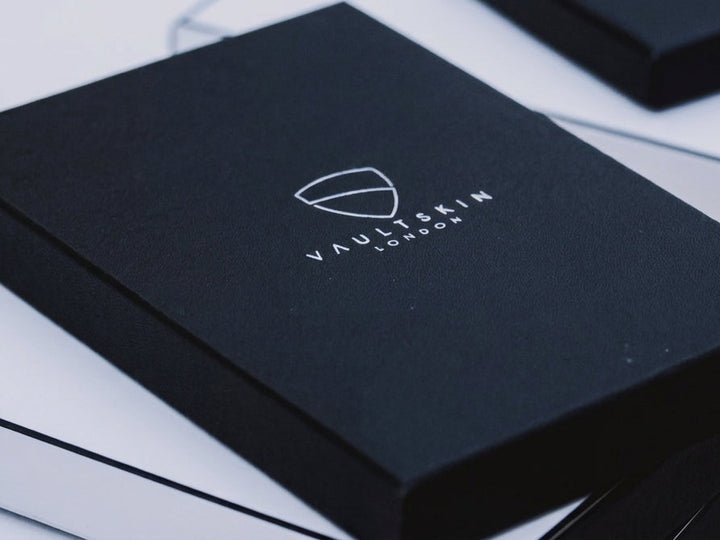 Vaultskin black box packaging on table