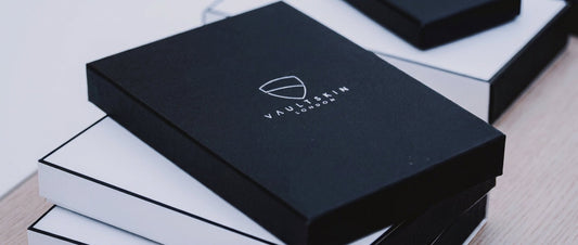 Vaultskin black box packaging on table