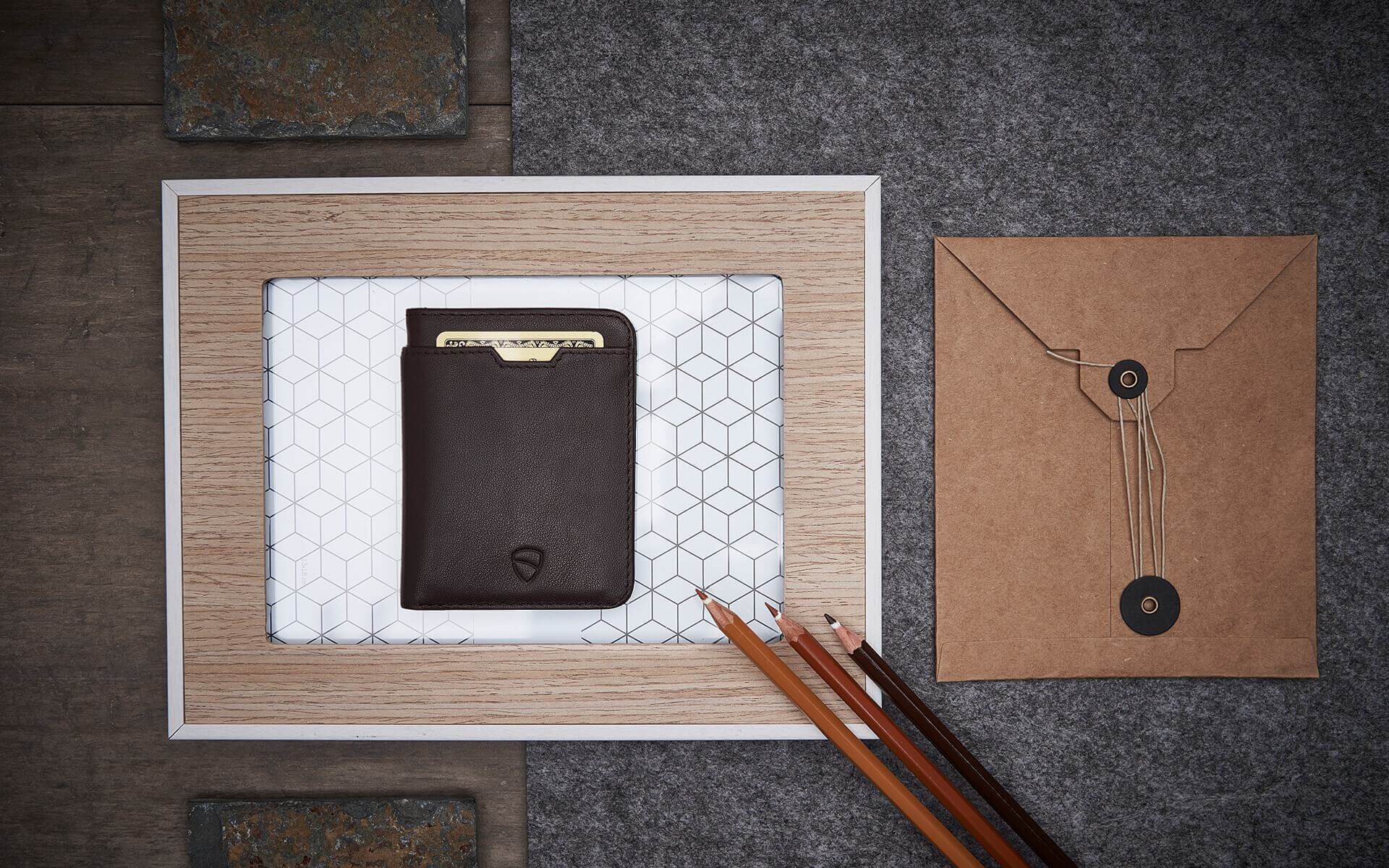 Showcase of Vaultskin CITY brown leather wallet, highlighting its slim, minimalist design perfect for the style-conscious user