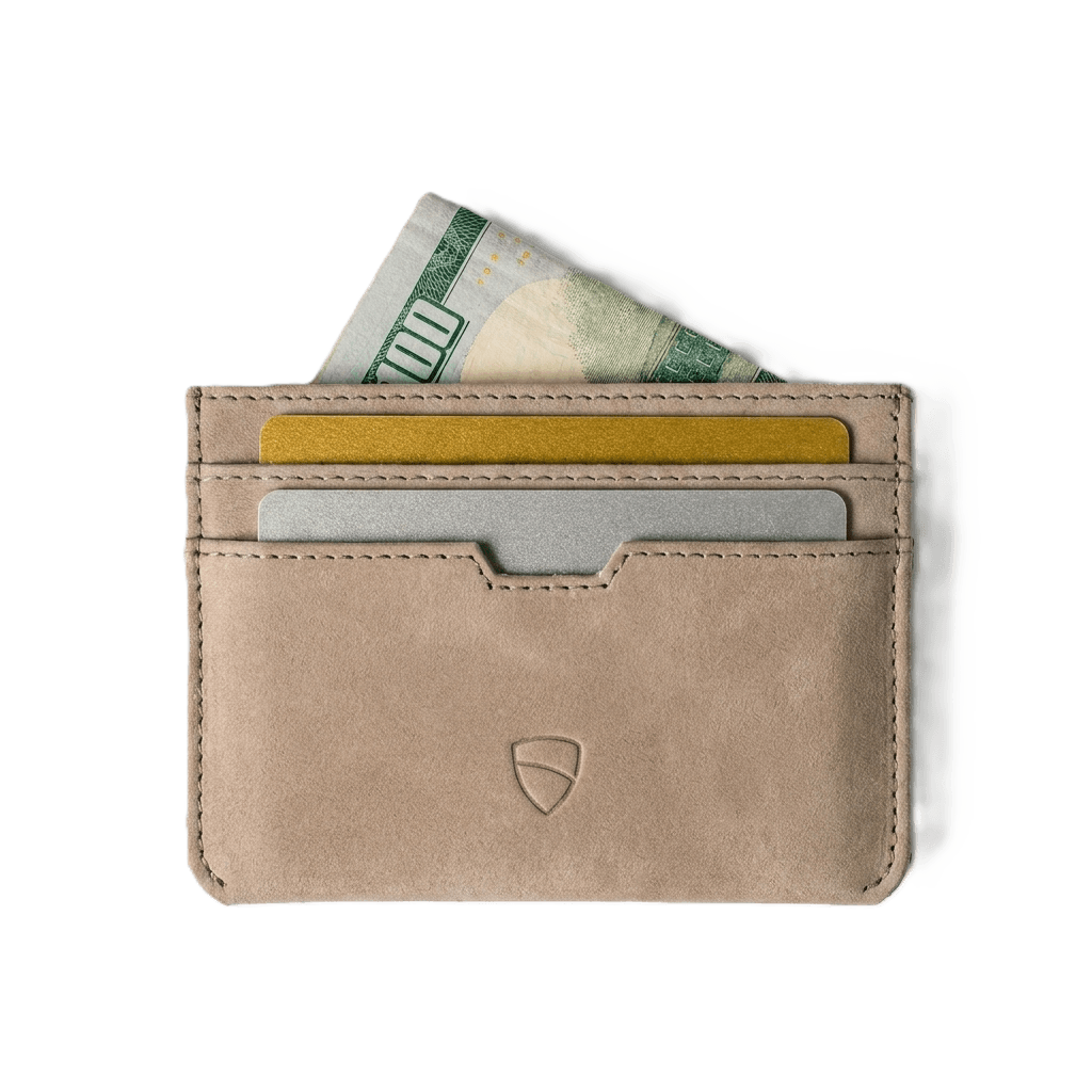 Vaultskin Moorgate sandstone minimalist leather wallet front view with Vaultskin shield logo, cards and cash, white background