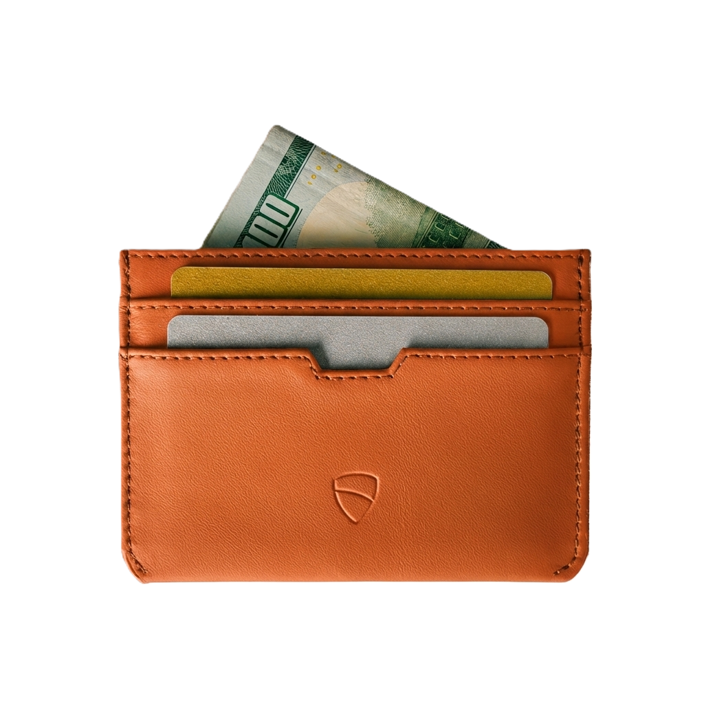Vaultskin Moorgate orange slim leather card holder with cards and cash, front view